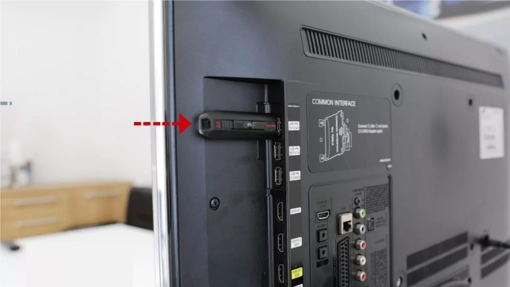 Connect the USB drive to your TV